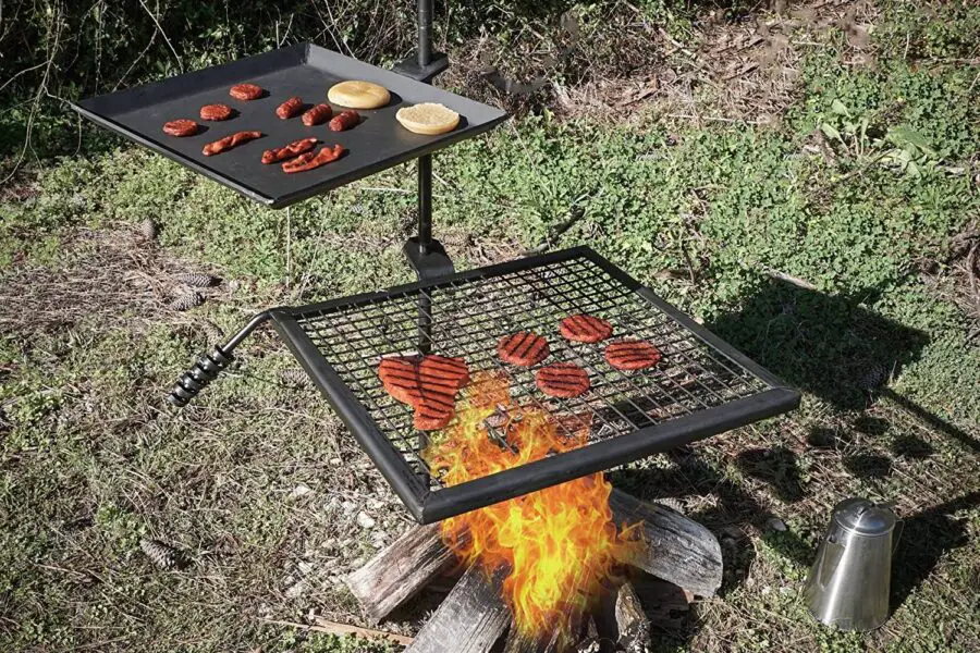 Portable Fire Pit Grill with food being cooked over an open flame, compared to top fire pit posts.