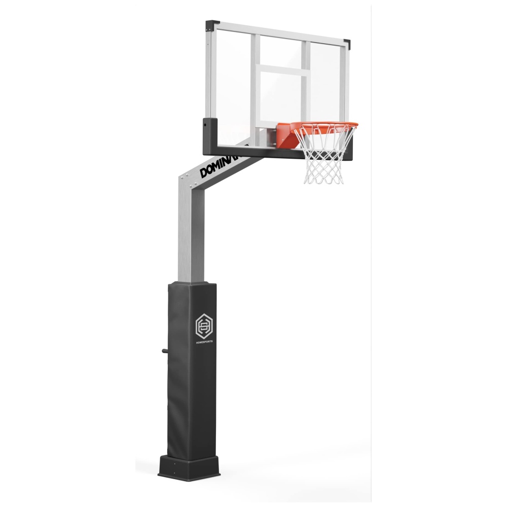 A modern basketball hoop with a clear backboard, labeled "dominus," mounted on a gray stand with a black padded base marked with a logo.