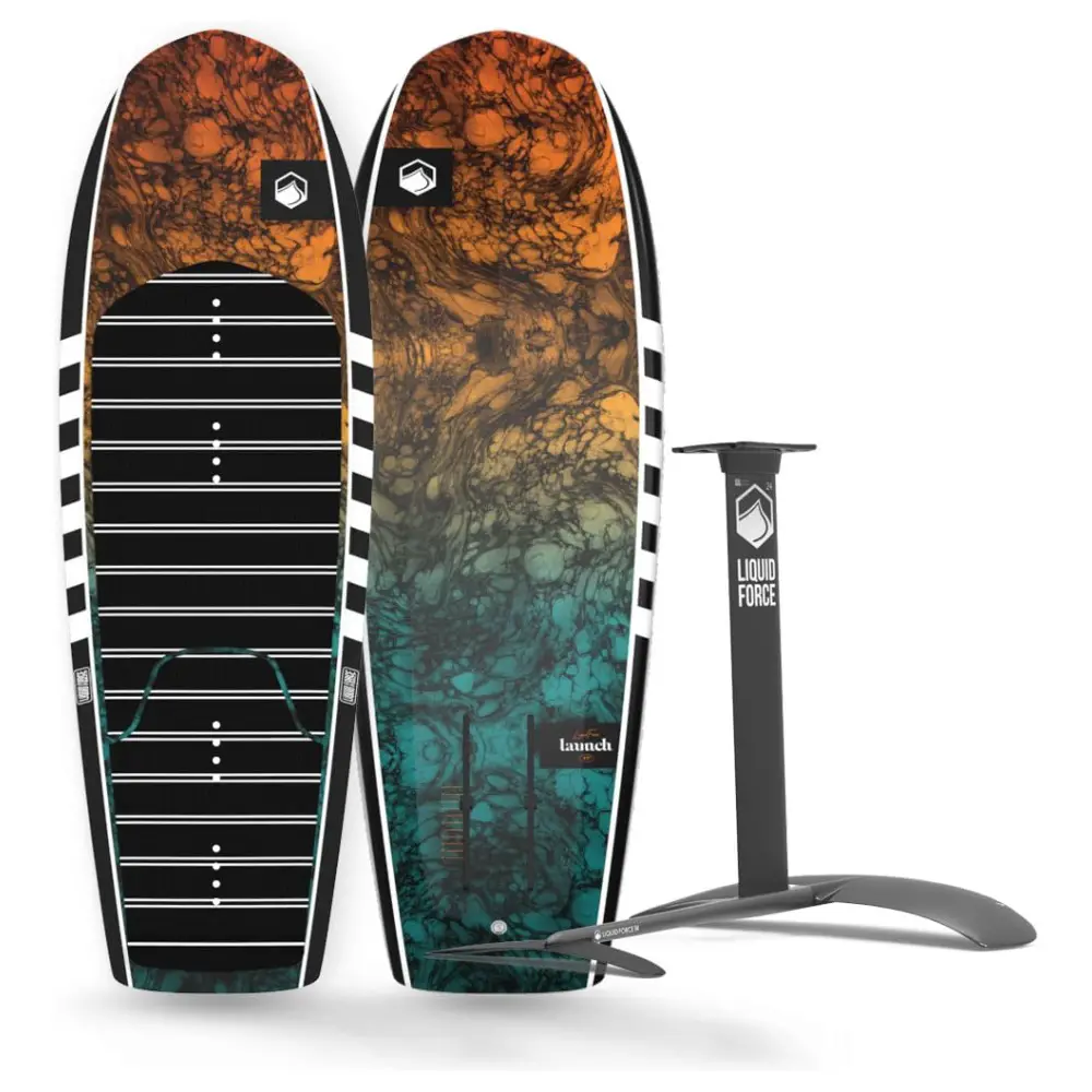 Two hydrofoil boards, one teal and the other orange with tree patterns, standing next to a black hydrofoil mast and wing.