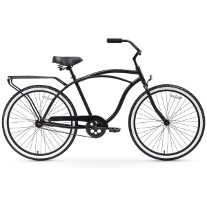 Black cruiser bicycle isolated on a white background.