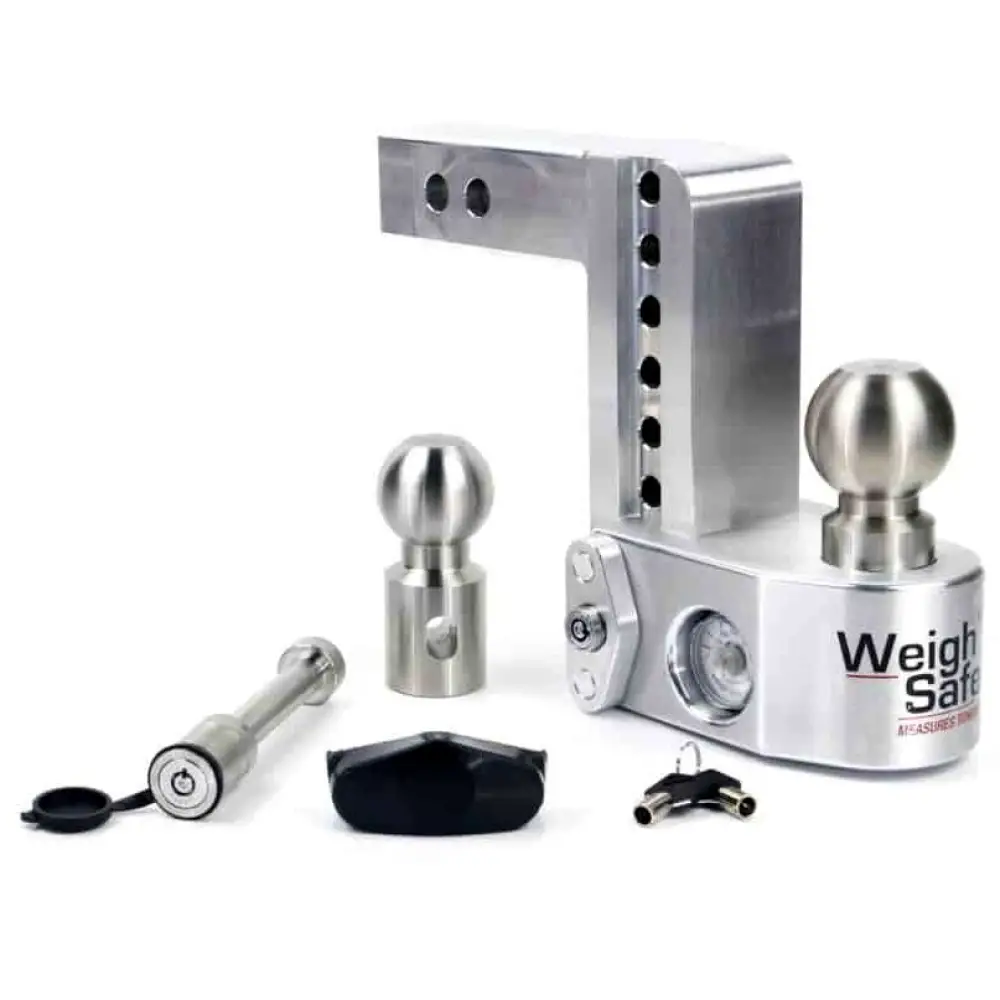 Weigh Safe Aluminum Drop Hitch with chrome balls, lock pins, and accessories displayed. "Weigh Safe" branding visible on the hitch.