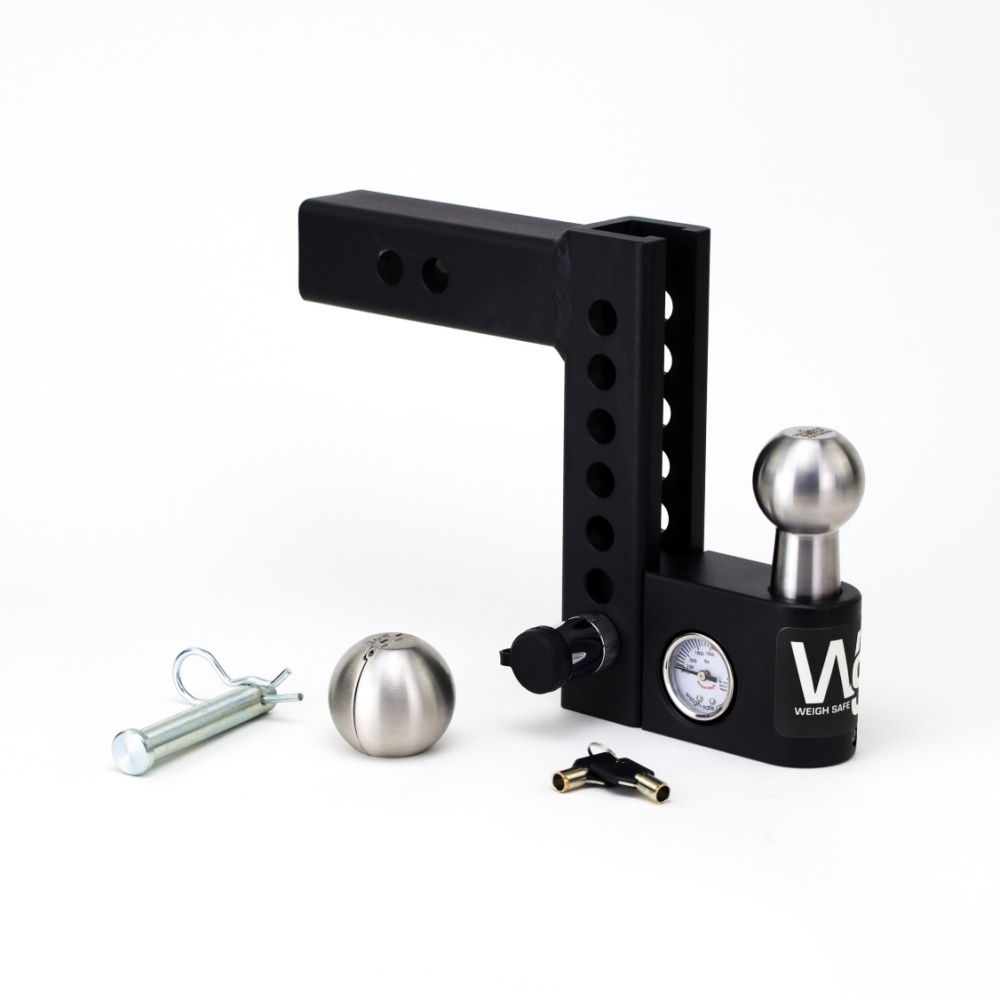 The Weigh Safe Steel Aero Adjustable Drop Hitch, featuring multiple holes and ball mounts, includes a Weigh Safe gauge, two hitch balls, a pin, and a clip, all displayed on a white background.