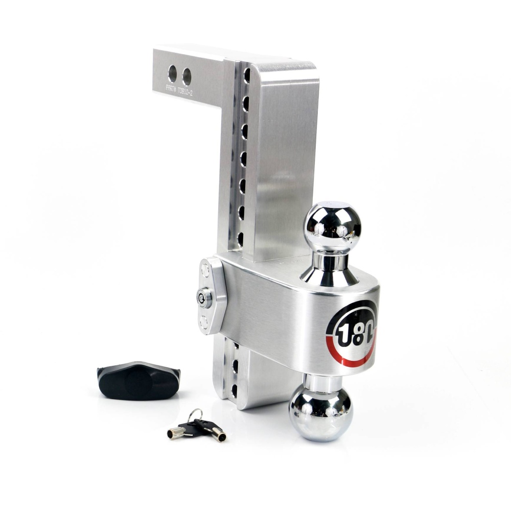 Weigh Safe Aluminum 180° Adjustable Drop Hitch with two chrome hitch balls, a black plastic cover, and two keys with a black key fob on a white background by Weigh Safe.