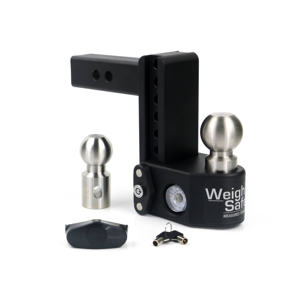 A Weigh Safe Steel Adjustable Drop Hitch and accessories, including two trailer balls of different sizes, a main hitch mechanism with a built-in scale, a pair of keys, and a small black cover.