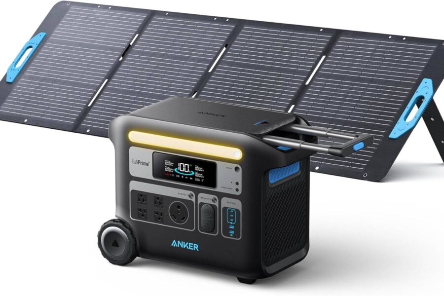 A portable solar power generator setup with a foldable solar panel and a power station displaying various outlets and a digital screen, ideal for ice fishing trips.